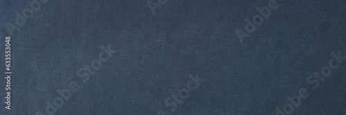 Unicolor blue fabric as background.