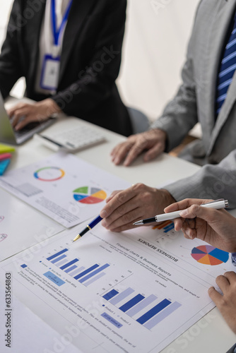 Принти на полотні Young businessmen have business investment ideas in the conference room, they are having brainstorming meetings and planning to manage the growth and profitability of the company