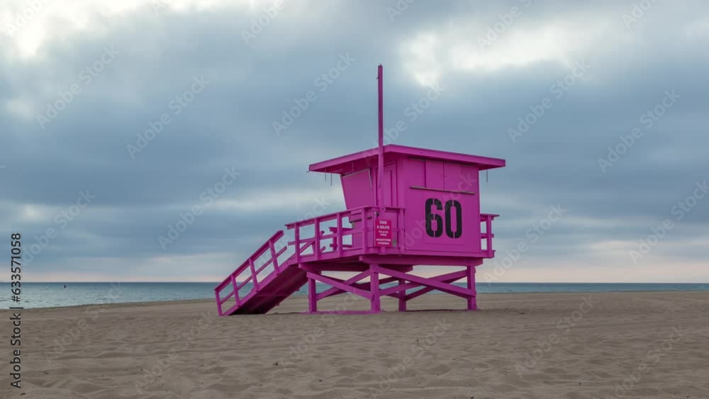 Pink Lifeguard Tower 60 On The Beach On A Cloudy Day. - timelapse. Breast cancer awareness. Pink Lifeguard Tower 60 On The Beach On A Cloudy Day. - timelapse. Breast cancer awareness.