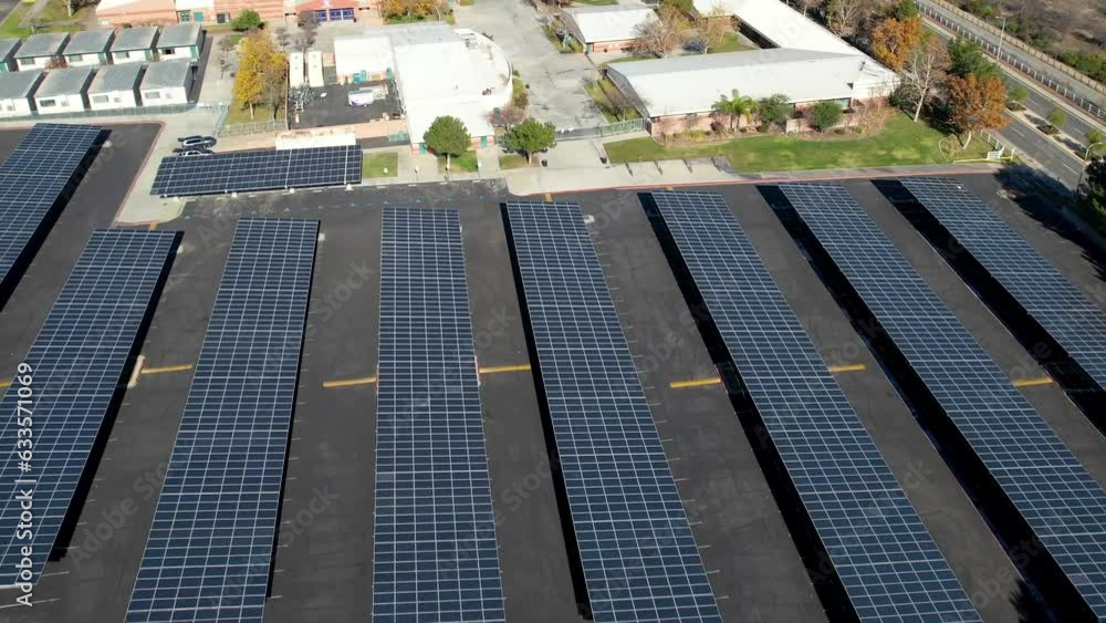 Drone Shot of Solar Panels on Massive Empty Parking Lot on Sunny Day, Green Energy Concept Drone Shot of Solar Panels on Massive Empty Parking Lot on Sunny Day, Green Energy Concept