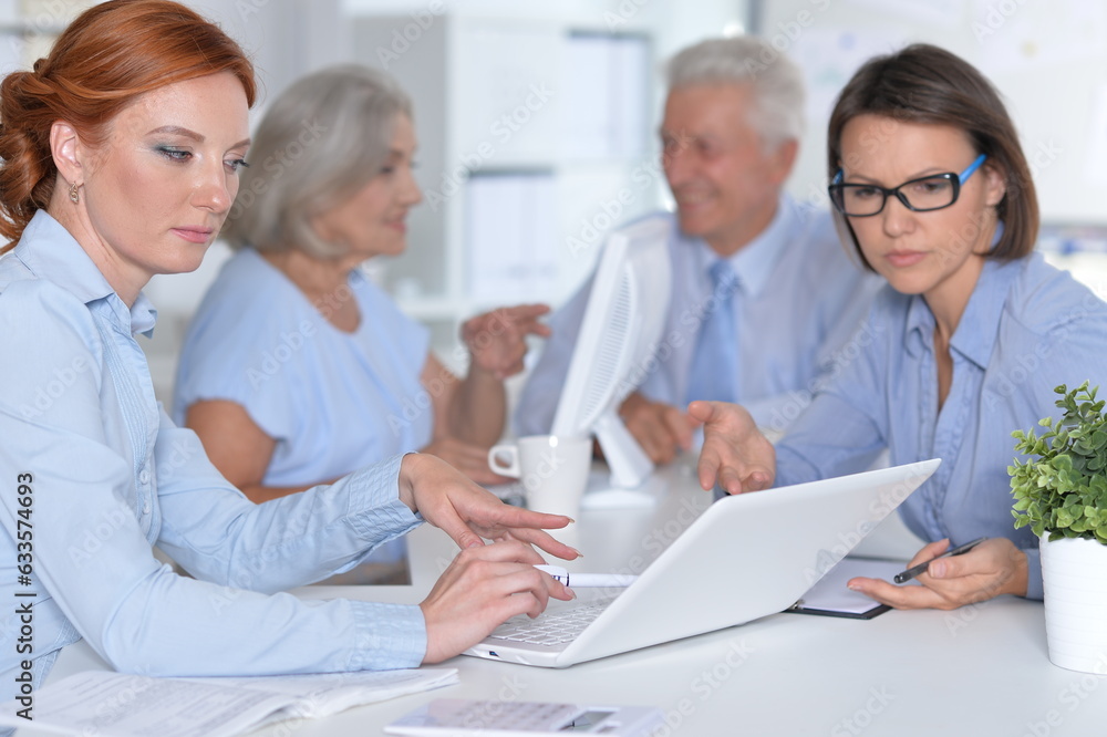 happy businesswomen and businessman working in office happy businesswomen and businessman working in office