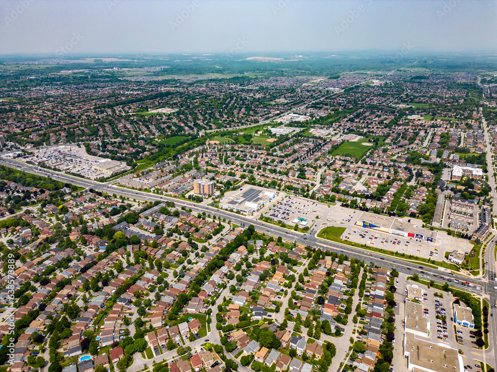 Experience the town of Ajax from an unprecedented height with our captivating high-up drone view. This shot reveals the intricate layout of Ajax, its sprawling neighborhoods, 