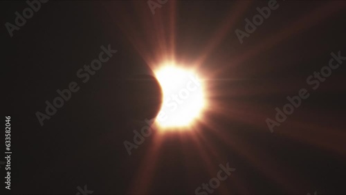 Rays of sun-light, moon covering the sun during Total Solar Eclipse. photo