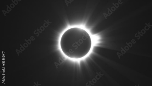 Sun, Moon and earth aligned for Total Solar Eclipse. Seamless Loop photo