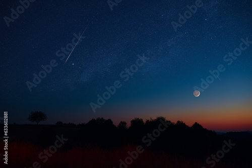 Stampa su tela Crescent Moon, falling star, planet conjunction and landscape scenery silhouettes