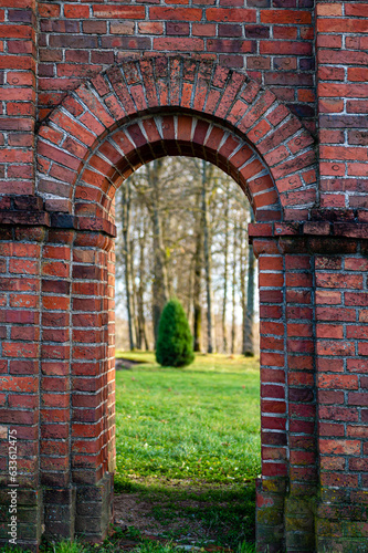 Old Catholic Church red brick gates in city Akniste  Latvia. Closeup