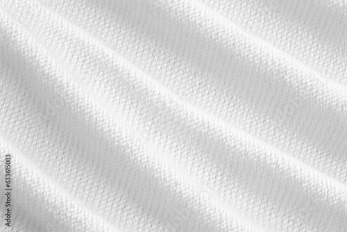 a soft white fabric with a smooth texture that reflects the light