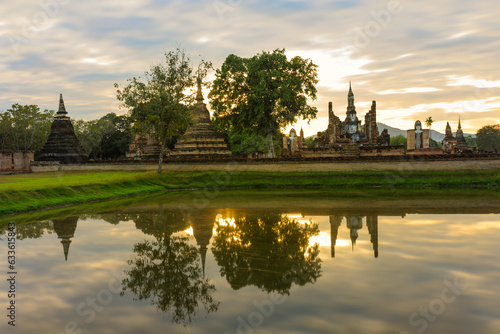 Ruins of the temple of Wat Mahathat Temple in the precinct of Sukhothai Historical Park, a UNESCO World Heritage Site, Evening in the historical park of Sukhothai city. Thailand © PRASERT