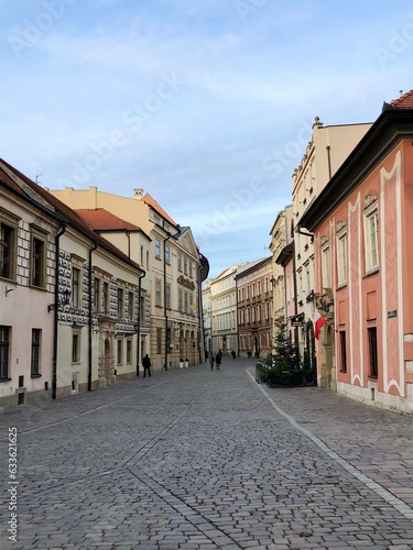 Cobblestone Street with Buildings Either Side in Krakow Old Town, Poland, Europe 