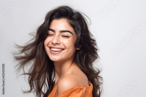 latina, portrait and woman in a studio with happiness, smile and joyful on a white background