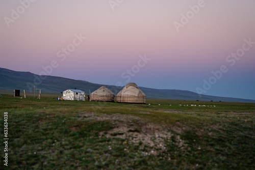 View to yurts in the middle of the mongolian steppe. Capturing the Magic of a Purple Sky at Sunset. The perfect time for landscape photography, the breathtaking colors create