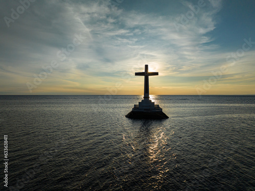 Sunken Cemetery with sun on the background in Camiguin Island. Historical landmark in the Philippines.