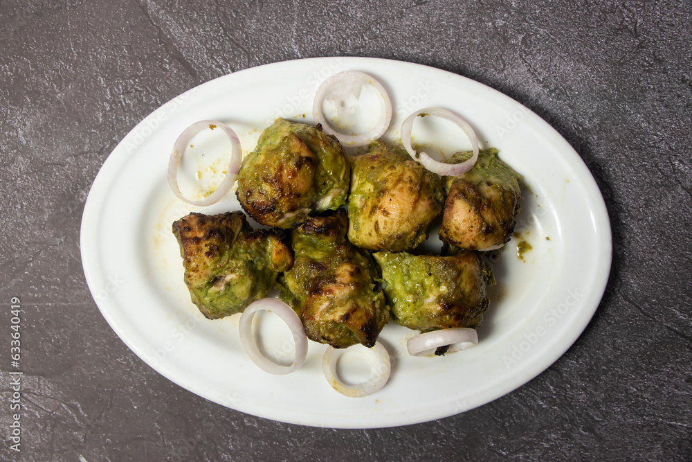 Chicken Hariyali tikka boti Kabab served in dish isolated on background top view of bangladesh food Chicken Hariyali tikka boti Kabab served in dish isolated on background top view of bangladesh food