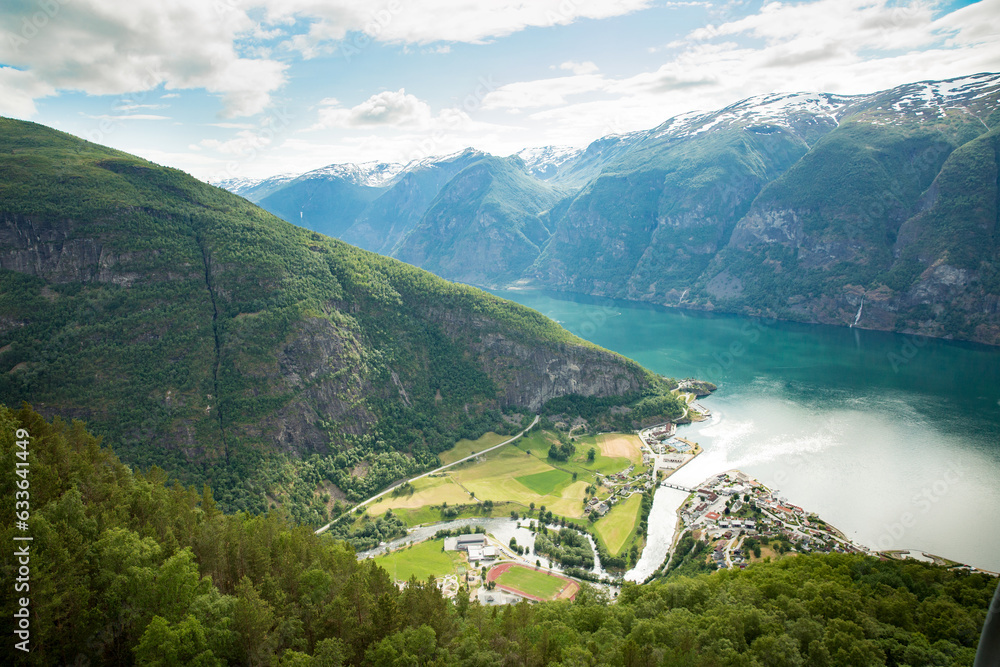 View from Stegastein viewpoint on the picturesque town of Flam in the Flomsdalen valley and Aurlandsfjord, Norway.