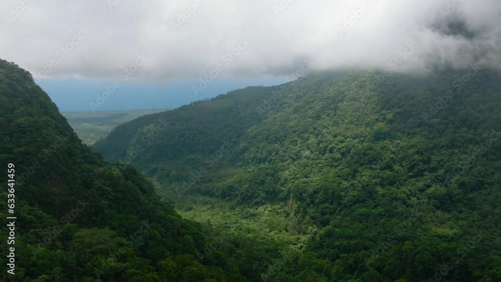 Tropical landscape with scenic mountain forest and jungle. Camiguin, Philippines. Tropical landscape with scenic mountain forest and jungle. Camiguin, Philippines.
