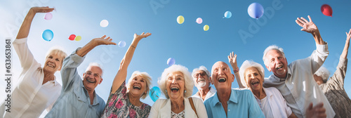 Low angle view of senior citizens having fun and looking at the camera