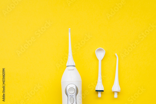 Mouth aerator on a yellow background with different nozzles. View from above