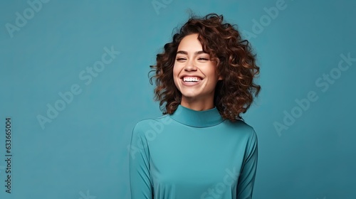 Studio portrait of cheerful woman with solid background