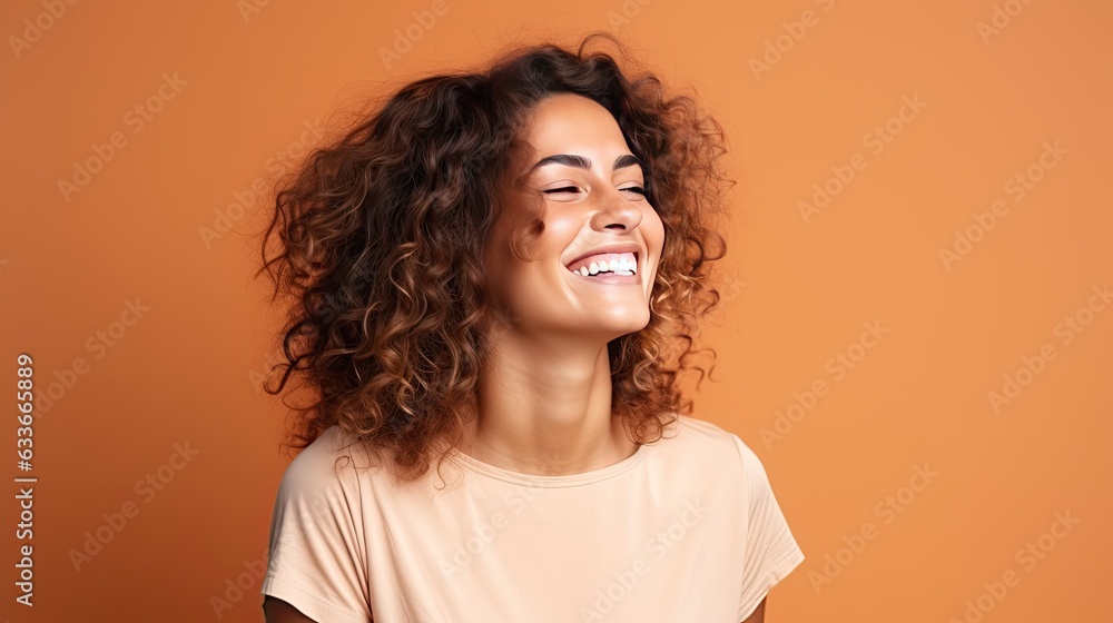 Happy woman posing in studio with solid background ready to take portrait Happy woman posing in studio with solid background ready to take portrait