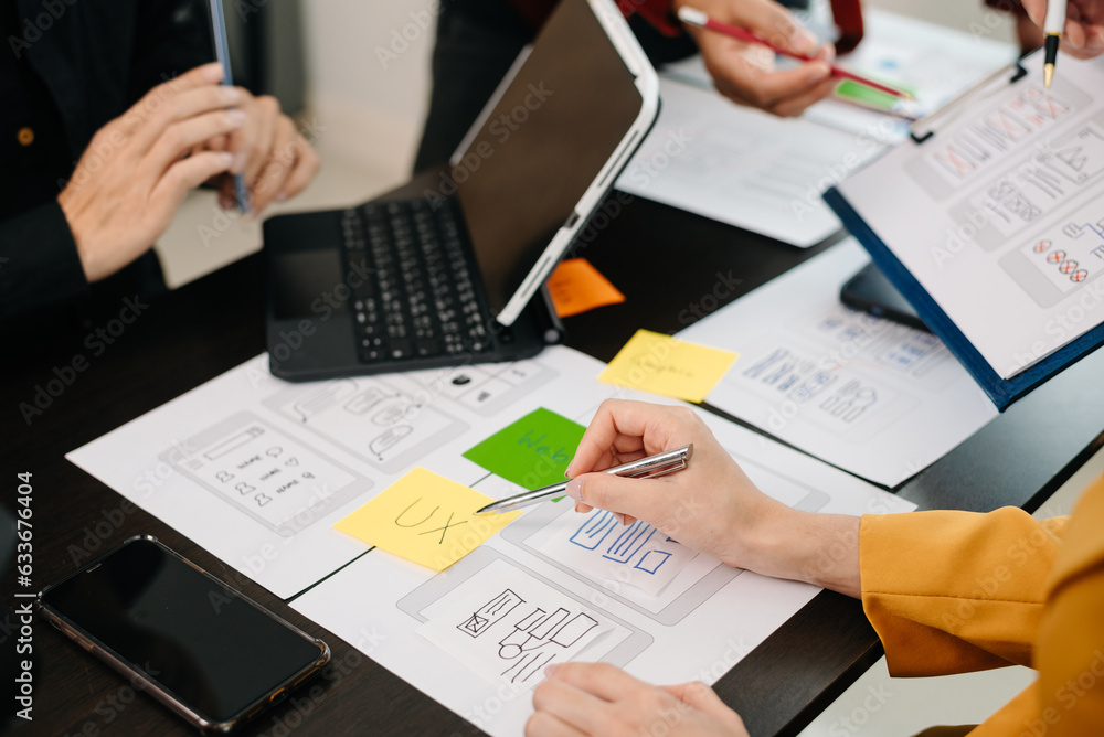 Obraz premium UX graphic designer planning application process development prototype wireframe for web smart phone. Creative digital development agency..