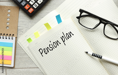 Wallpaper Mural open notepad with text. glasses on a notebook. text pension plan Torontodigital.ca
