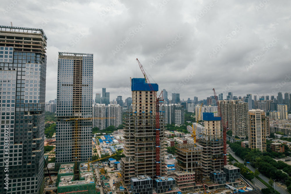 Obraz premium Shenzhen ,China - June 02 2022: Aerial view of construction site and landscape in Shenzhen city, China