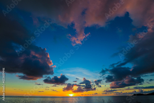 Spectacular Sunset with the Golden Sunlight and Cloudy Sky on the Guadeloupe  Caribbean islands