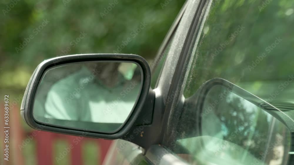automotive theme
green not very clean car
the driver gets behind the wheel and adjusts the mirrors, opens the window and looks in the mirror and smiles with satisfaction automotive theme
green not very clean car
the driver gets behind the wheel and adjusts the mirrors, opens the window and looks in the mirror and smiles with satisfaction