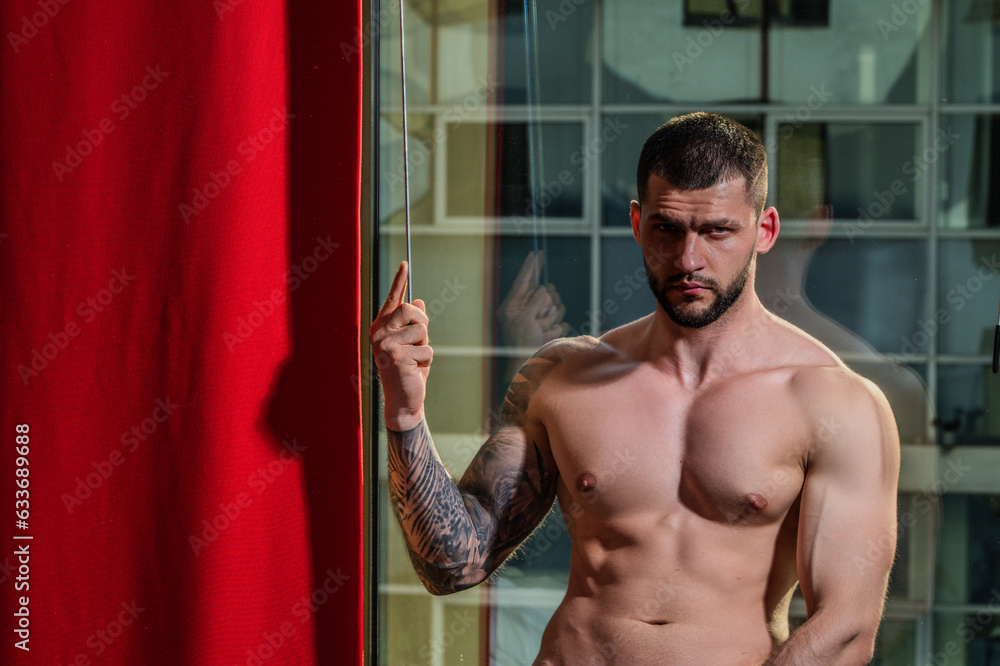 Man standing near window. Seductive gay. Muscular body of man in hotel room. Sexy guy with naked body. Nude muscular man body with tattoo. Sexy man with muscular chest in bedroom on window curtains. Man standing near window. Seductive gay. Muscular body of man in hotel room. Sexy guy with naked body. Nude muscular man body with tattoo. Sexy man with muscular chest in bedroom on window curtains.