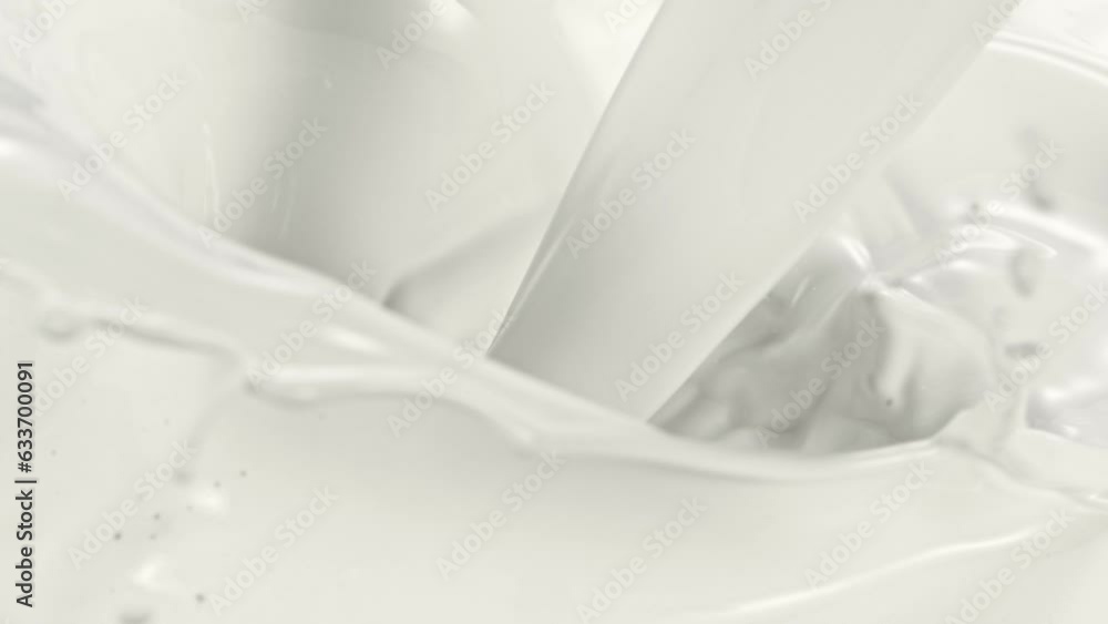 Super Sow Motion of Pouring Milk Splash. Filmed on High Speed Cinema Camera, 1000 fps. Super Sow Motion of Pouring Milk Splash. Filmed on High Speed Cinema Camera, 1000 fps.