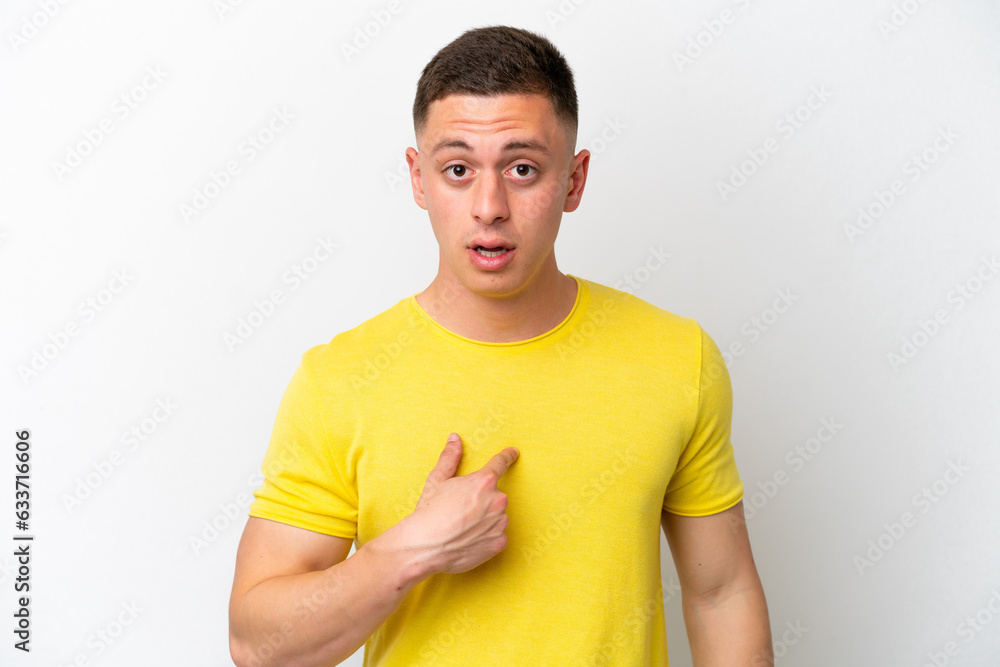 Young brazilian man isolated on white background pointing to oneself Young brazilian man isolated on white background pointing to oneself