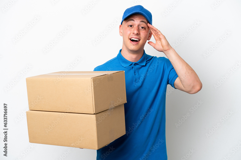 Young delivery Brazilian man isolated ops white background with surprise expression Young delivery Brazilian man isolated ops white background with surprise expression