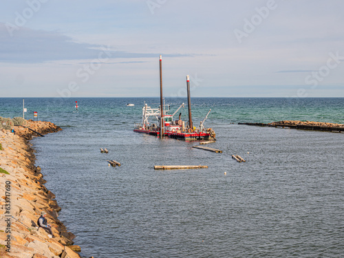 Dredger In Rivermouth photo