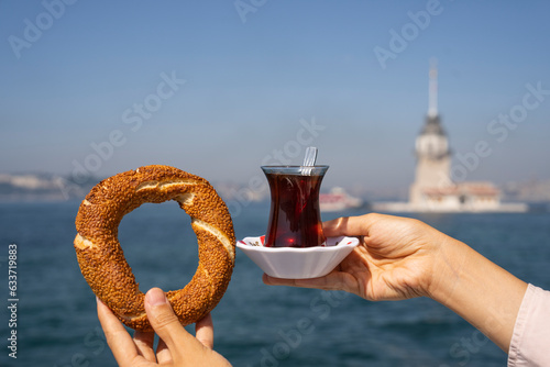 Photography Turkish Tea (Türk Cayi) and Turkish Bagel (Turk Simit) in front of the Uskudar S