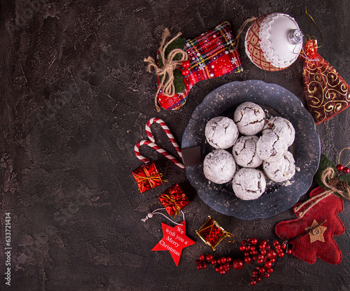 Traditional Christmas almond chocolate snowballs cookies biscuits covered icing sugar powder. Russian Tea Cakes, Mexican Wedding Cookies, Butterballs. Top view. copy space