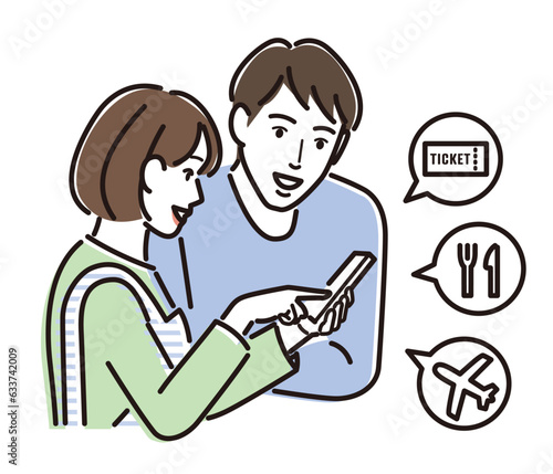 一緒にスマホを見て旅行の計画を考える夫婦