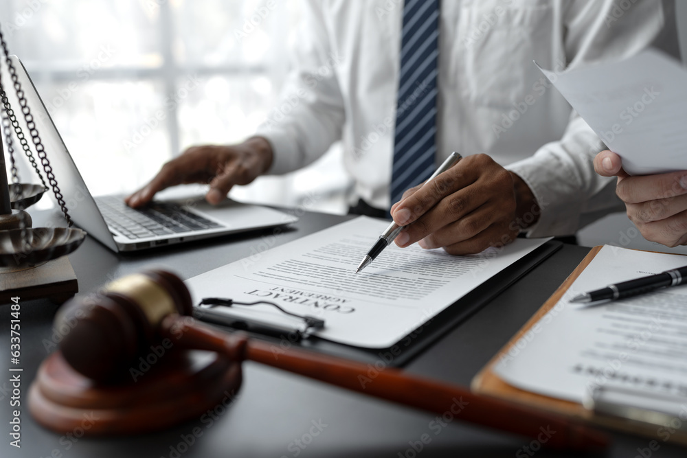 Fototapeta premium Businessmen or lawyers working together at a meeting, teamwork and partnership. Signing documents, contracts, checking details business agreement
