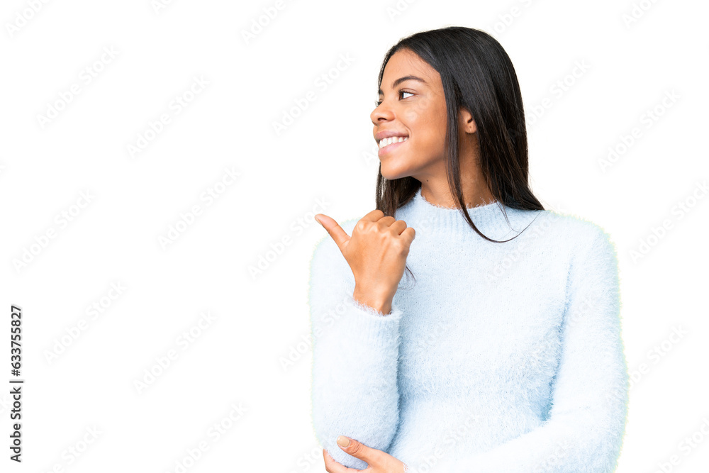 Young African American woman over isolated chroma key background pointing to the side to present a product Young African American woman over isolated chroma key background pointing to the side to present a product