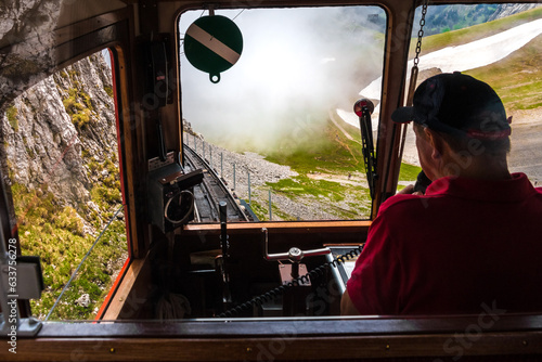 Nice view from inside the world’s steepest cogwheel railway. From the driver's seat you can see the train descending from the Pilatus Kulm mountain station to the valley station in Alpnachstad.