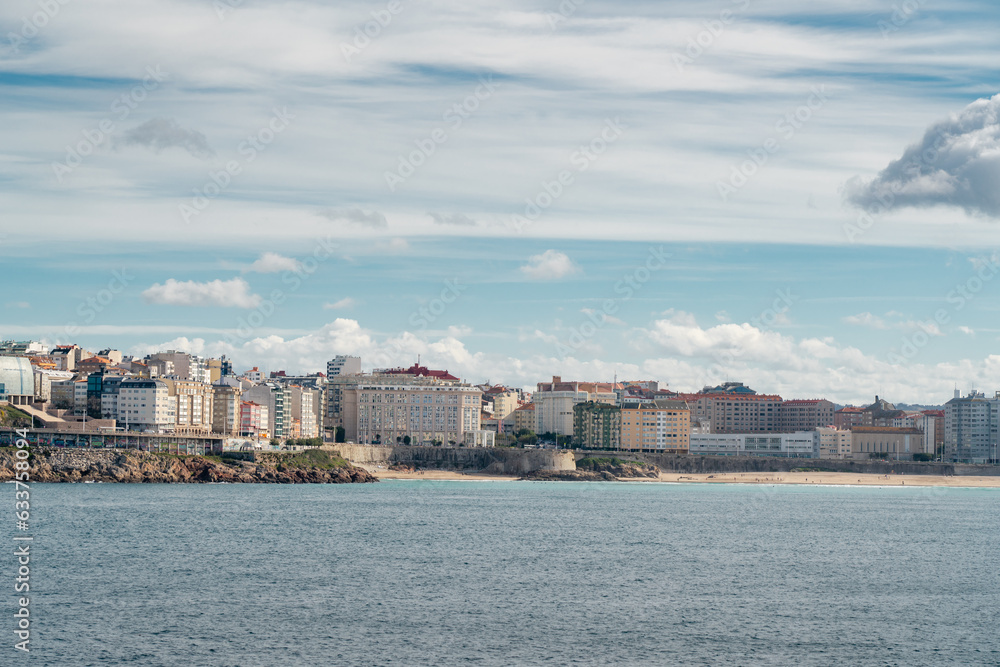Beautiful A Coruna city. Situated in Galicia, Northwest of Spain. Travel destination. Panoramic view of the city. View of Riazor Beach and Orzán beach. Travel destination in Galicia, North of Spain.