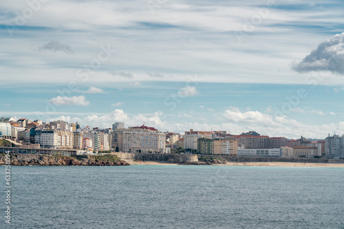 Beautiful A Coruna city. Situated in Galicia  Northwest of Spain. Travel destination. Panoramic view of the city. View of Riazor Beach and Orz  n beach. Travel destination in Galicia  North of Spain.