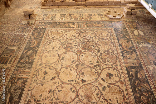 An ancient, archeological mosaic inscription from the Roman era, located in the Jordanian Arab governorate of Madaba in the Middle East
