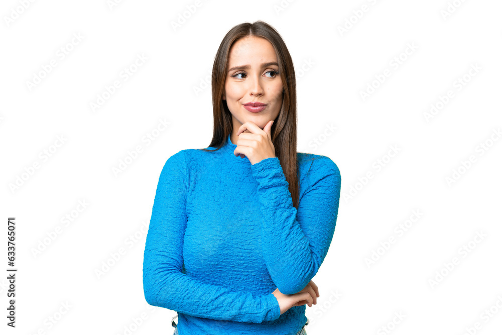 Young beautiful woman over isolated chroma key background thinking an idea while looking up Young beautiful woman over isolated chroma key background thinking an idea while looking up
