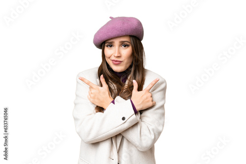 Young beautiful woman over isolated chroma key background pointing to the laterals having doubts