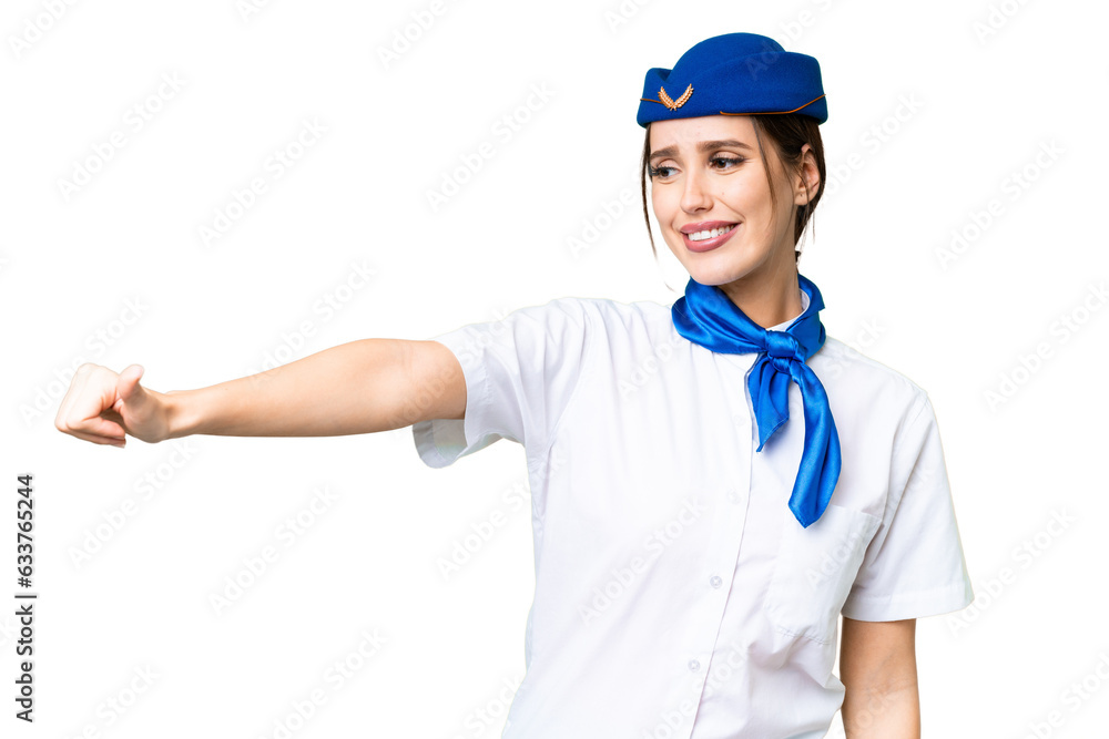 Airplane stewardess over isolated chroma key background giving a thumbs up gesture Airplane stewardess over isolated chroma key background giving a thumbs up gesture