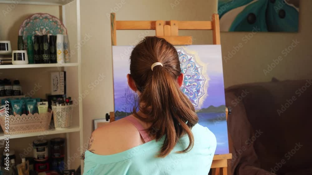 Talented Brunette Artist Captures Creativity While Painting on Canvas. Talented Brunette Artist Captures Creativity While Painting on Canvas.