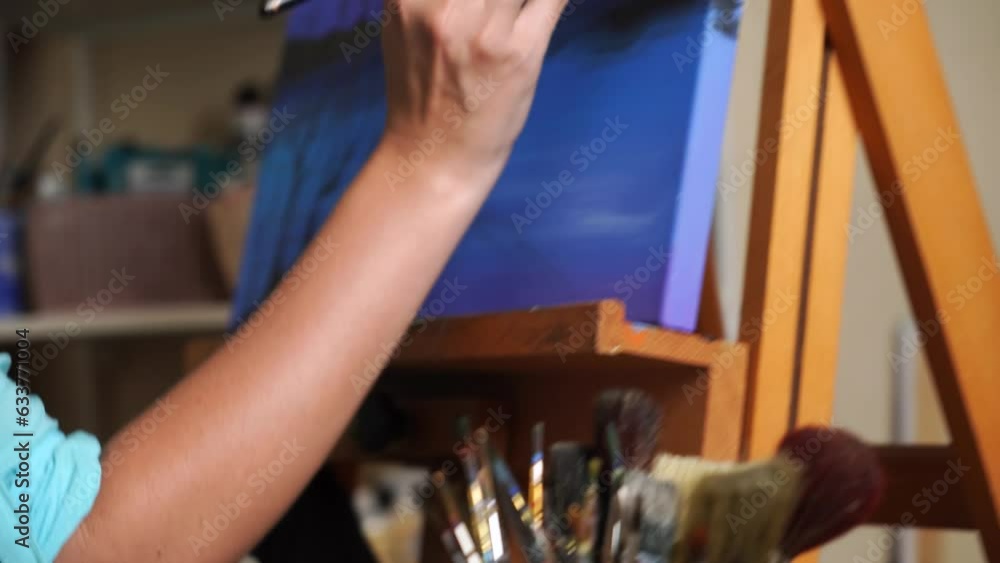 Expressive Painting: Adult Female Artist in Creative Studio. Expressive Painting: Adult Female Artist in Creative Studio.