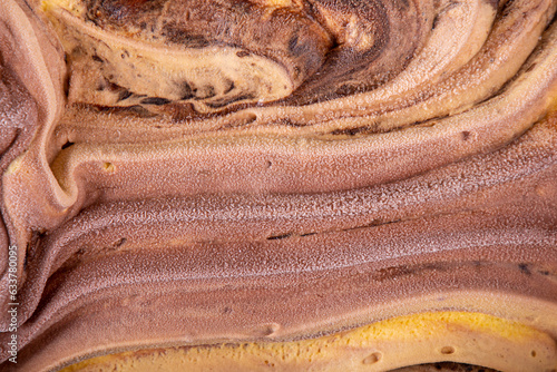 Structure texture orange fruit and chocolate ice cream. Close up