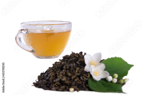 Dried tea leaves, fresh jasmine blossoms with green leaf and translucent glass tea cup showcased in isolation against transparent backdrop