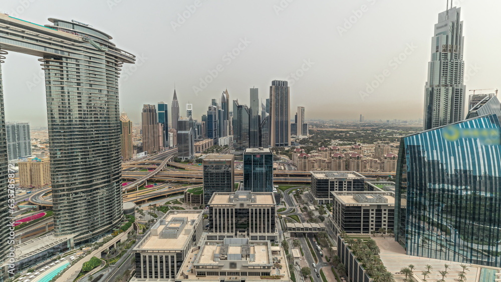 Pnorama showing futuristic Dubai Downtown and finansial district skyline aerial timelapse.